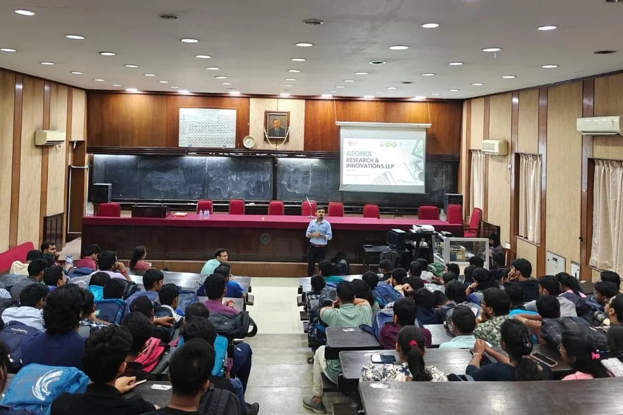 Aeonix presenting to a student audience in a college auditorium