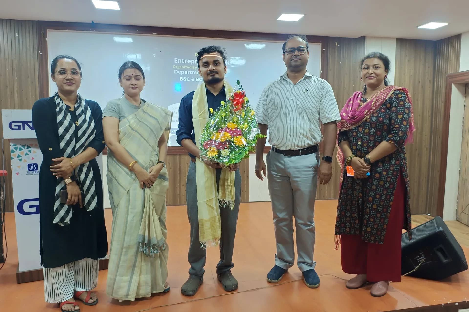 Aeonix felicitated with flowers at a college industry event