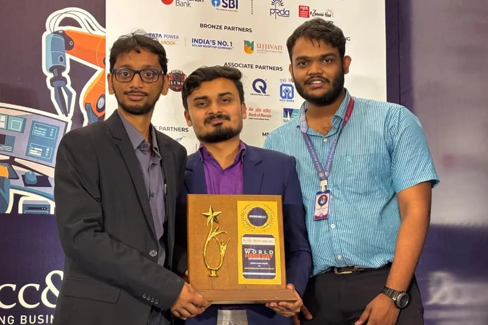 Aeonix team receiving an award at a startup and business showcase